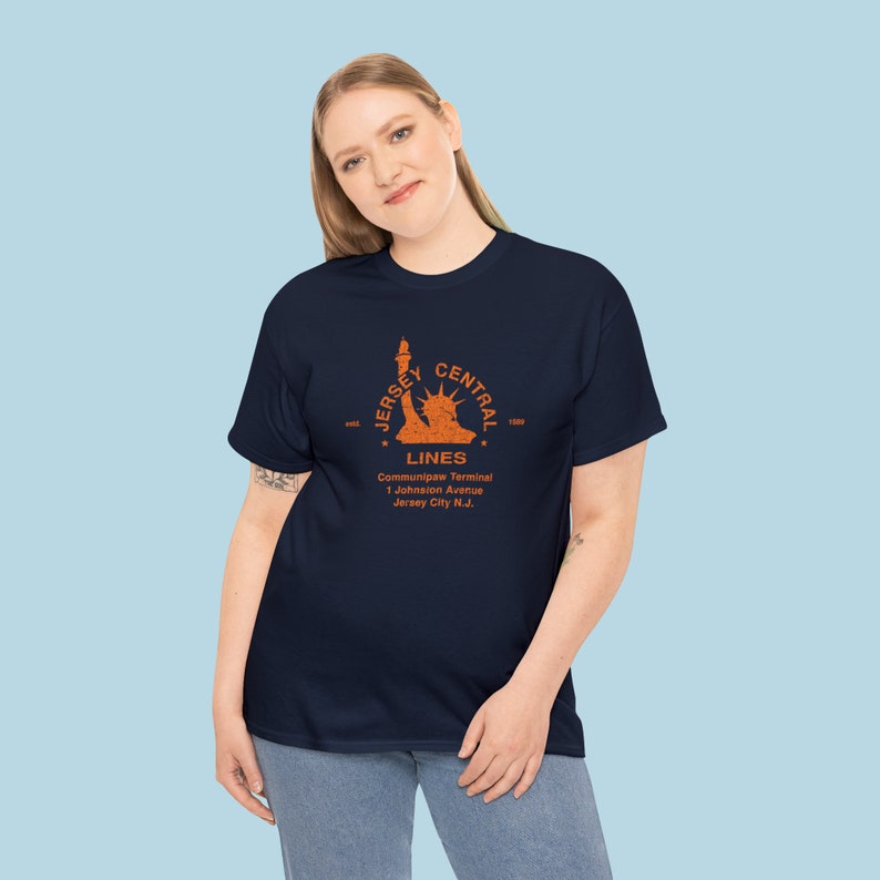 Stylish woman in her 20s poses in the Central Railroad of New Jersey CNJ t-shirt, a unique train enthusiast gift