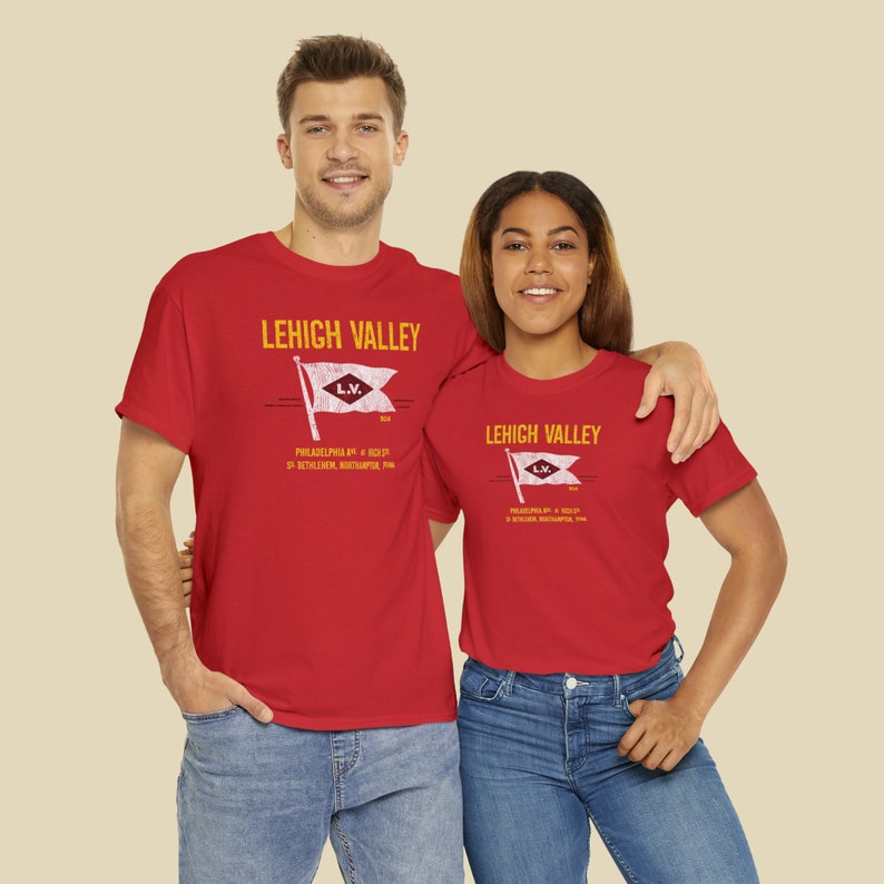 Young happy couple wearing Red Lehigh Railroad t-shirts, looking at us