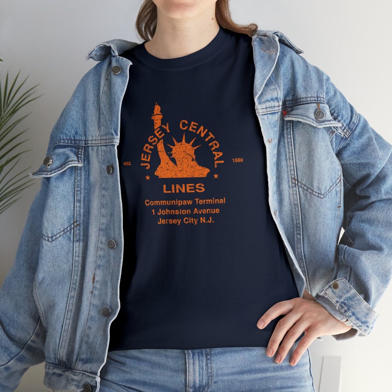 Lifestyle shot, woman pairs denim jacket with CNJ train shirt, a unique train lover gift