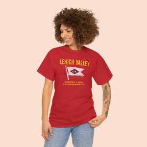 Happy young woman wearing Red Lehigh Railroad t-shirt, looking left