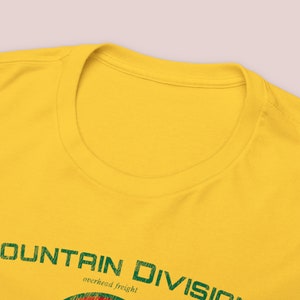 Front t-shirt collar neck ring closeup of Yellow or Green Maine Central Railroad t-shirt