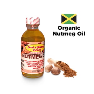 May include: A glass bottle of organic nutmeg oil with a green and yellow Jamaican flag in the background. The bottle is labeled "Jah Mazin Herbs" and "Nutmeg Oil". The bottle is 2 ounces and is 100% natural. The oil is used to treat inflammation, swelling, joint pain, muscle pain, and sores.