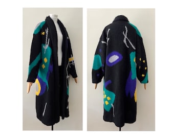 Oversized handgebreide lange vestjas met abstract patroon