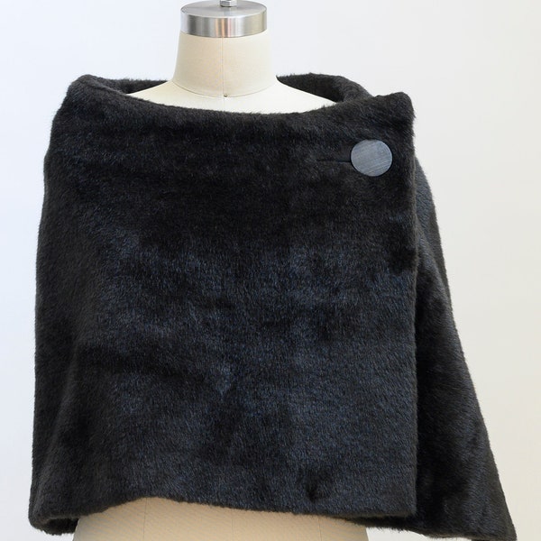 Stunning vintage faux fur wrap/cape from the 1960s. Calling all Jackie fans! Faux mink shrug, stole is luxuriously soft. Jackie and Audrey.