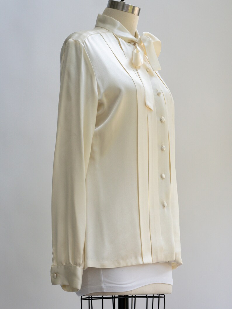 Vintage Neiman Marcus, Cream Satin Pleated Blouse With Self Tie. Pussy