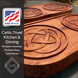 May include: Two solid wood trivets with a Celtic knot design carved into the surface. The trivets are made in the U.S.A. and are for kitchen and dining use. The text on the image says "Celtic Trivet Kitchen & Dinning Multiple materials Multiple Sizes Solid Wood".
