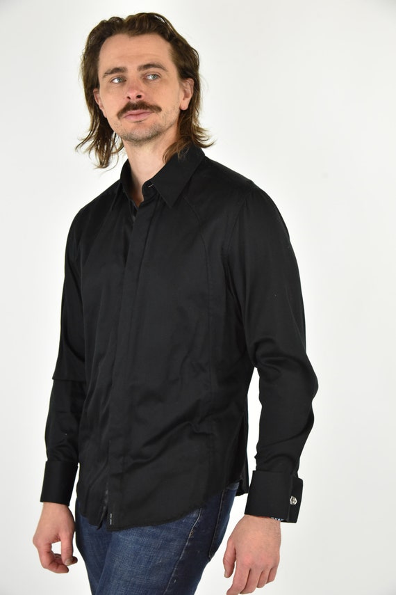 black button down and jeans