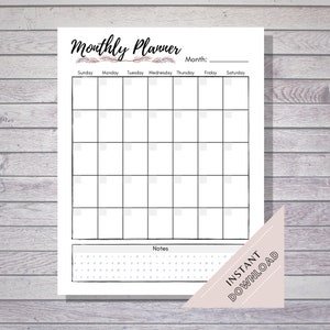 May include: A printable monthly planner with a black and white design. The planner has a section for notes at the bottom. The text "Monthly Planner" is at the top of the page.