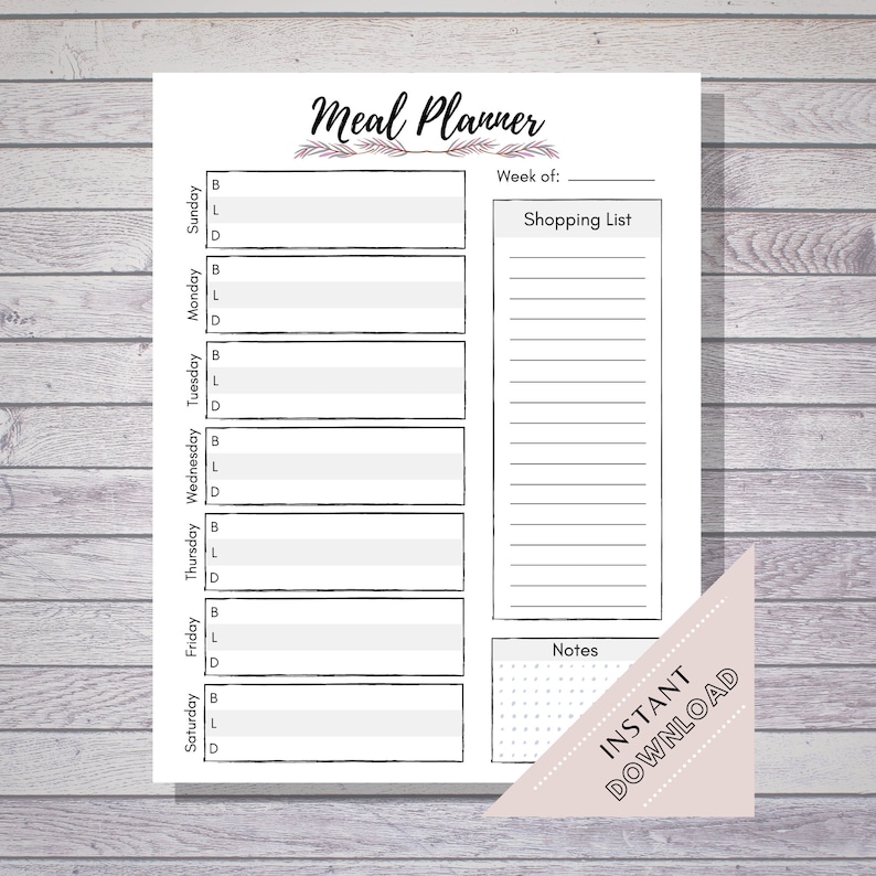 May include: A white meal planner with a black border, featuring sections for each day of the week, a shopping list, and notes. The title "Meal Planner" is in elegant script. A pink triangle with "Instant Download" is in the bottom right corner.