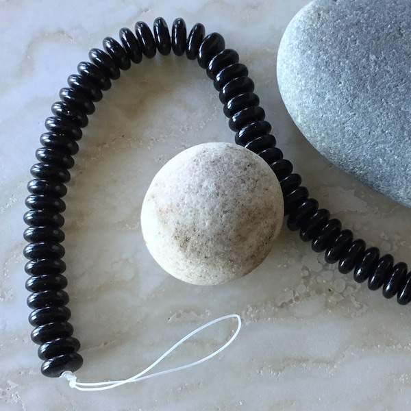 Destash Beads:  50 matte black rondelle spacer beads