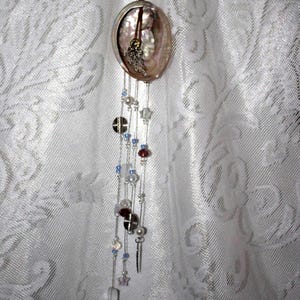 May include: A set of three ceramic mugs with a speckled, matte finish. The mugs are in shades of cream, light gray, and dark gray. Each mug has a simple, minimalist design, perfect for coffee or tea.