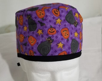 Gorro quirúrgico reversible con estampado de gato negro y calabaza