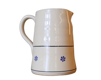 Traditional ceramic pitcher serving beverage
