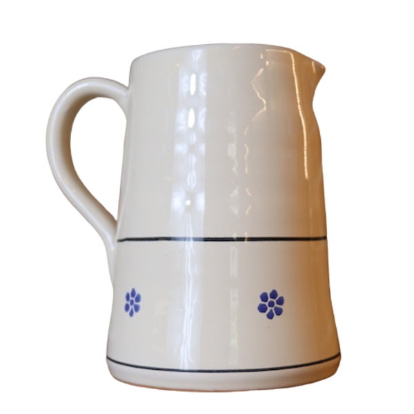 Traditional ceramic pitcher serving beverage