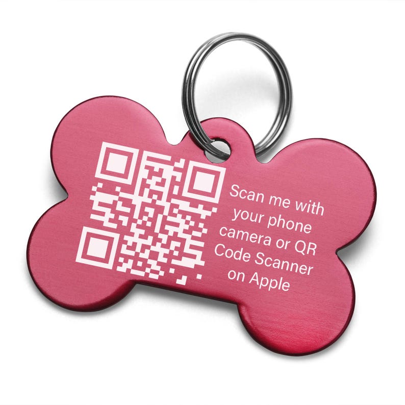 May include: A red bone-shaped dog tag with a white QR code and the text "Scan me with your phone camera or QR Code Scanner on Apple".