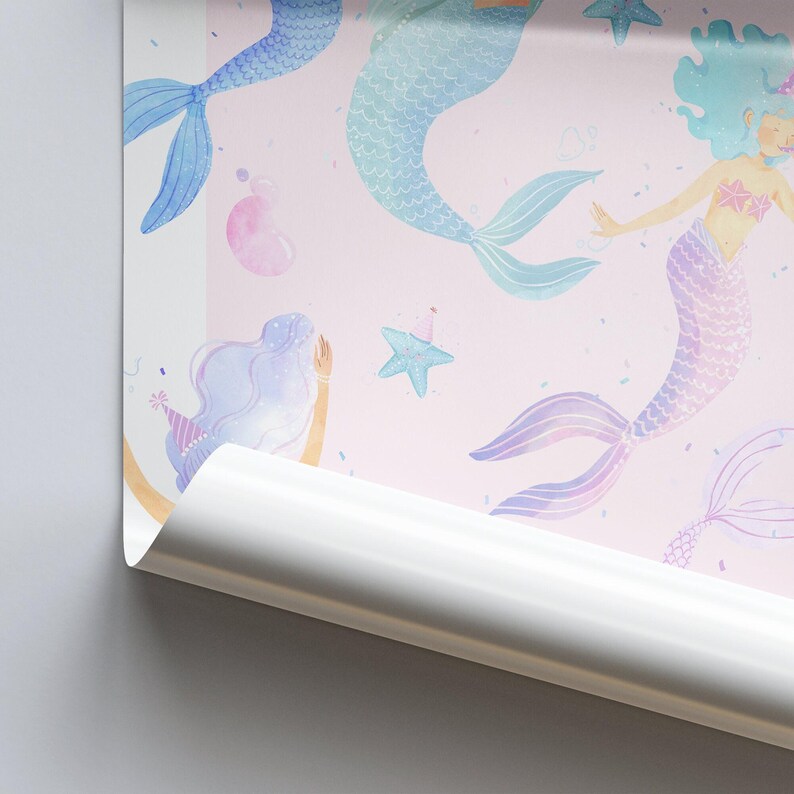 May include: Pink wallpaper featuring watercolor illustrations of mermaids with blue, purple, and teal tails. The mermaids have light blue and purple hair, and some wear party hats. Starfish and bubbles are also scattered across the design.