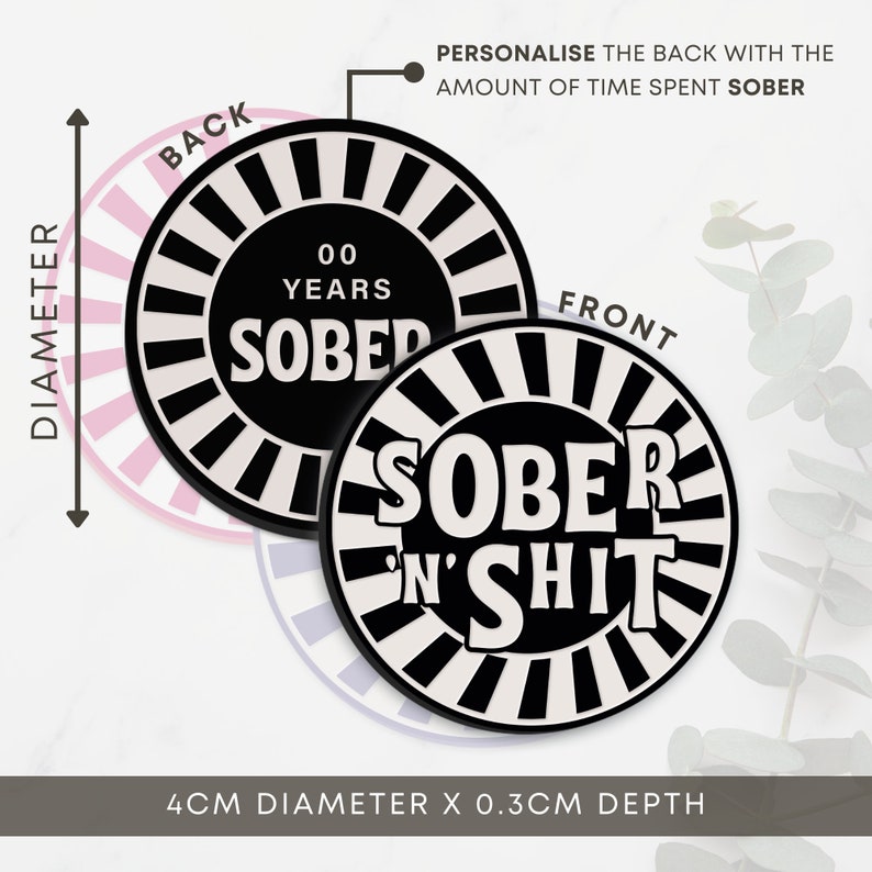 May include: Black and white round coaster with the text "SOBER N' SHIT" on the front and "00 YEARS SOBER" on the back. The coaster is 4 inches in diameter and 0.3 inches deep.