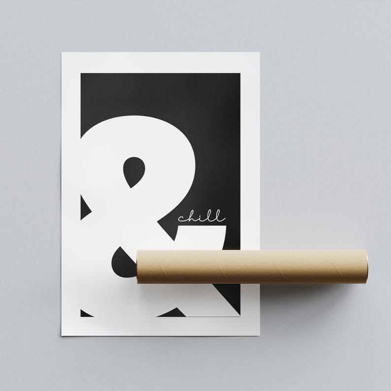 May include: Black and white print with a large white ampersand symbol and the word "chill" in white script below the ampersand.