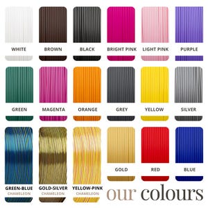 May include: A chart showing 15 different colors of filament for 3D printing. The colors include white, brown, black, bright pink, light pink, purple, green, magenta, orange, grey, yellow, silver, gold, red, and blue. The filament is arranged in rows of five, with each color labeled below it. The text "our colours" is at the bottom of the chart.