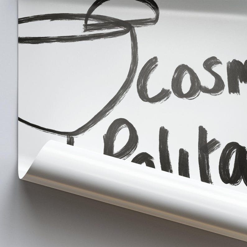 May include: A white surface with black marker writing that says "cosmetics" and "Balita". A black marker drawing of a cup is in the top left corner of the image.