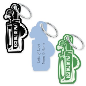 May include: Three golf bag keychains, one black with the text "Best Dad by Par", one light blue with the text "Lots of Love Name & Name", and one green with the text "Best Dad by Par".