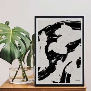 May include: Black and white abstract art print with a chess theme. The print features a stylized image of chess pieces in a dynamic composition. The text "Checkmate" is at the bottom of the print.