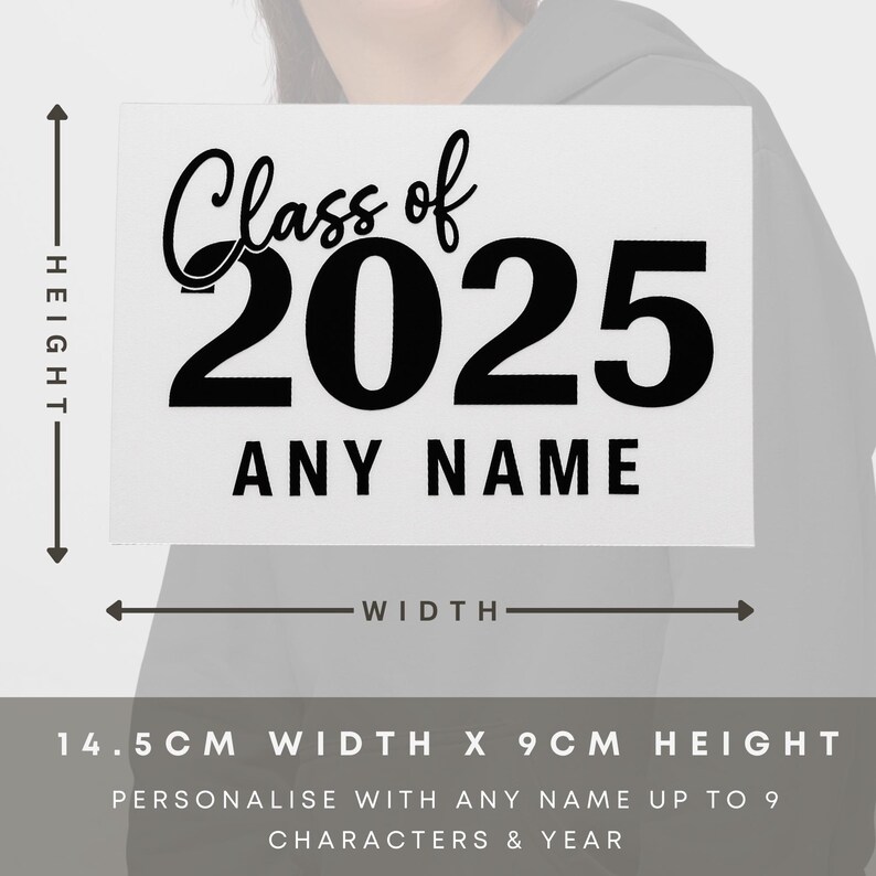 May include: A white rectangular sign with the text "Class of 2025" in black script and bold font. Below, it reads "ANY NAME". The sign is 5.7 inches wide and 3.5 inches high. The sign is for personalization.