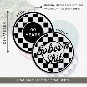 May include: Black and white chequered round pin with the text "Sober 'n Shit" on the front and "00 Years" on the back. The pin is 4 cm in diameter and 0.3 cm deep.