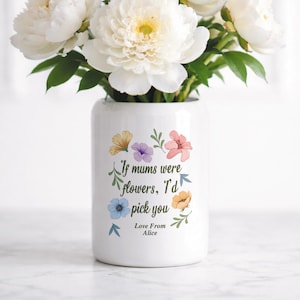 May include: A set of three ceramic mugs with a speckled, matte finish. The mugs are in shades of cream, light gray, and dark gray. Each mug has a simple, minimalist design and a rounded handle.