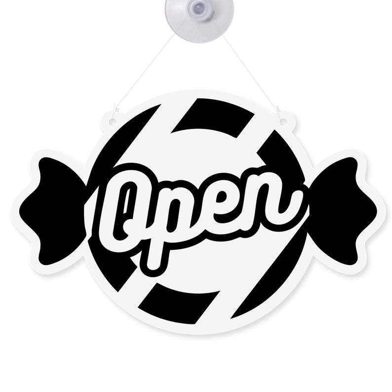May include: A white and black candy-shaped sign with the word "Open" in a cursive font. The sign is hanging from a suction cup. The design features black stripes and black candy wrapper ends.