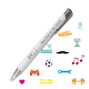 May include: White pen with silver accents and the inscription "Best Dad In The World".  The pen is surrounded by colorful icons including a car, a trophy, a laptop, a mustache, musical notes, a soccer ball, a game controller, a wrench, a dumbbell, a heart, and a pair of chopsticks.