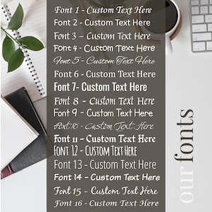 May include: A grey background with white text listing 16 different fonts with the text "Custom Text Here" in each font. The text "our fonts" is written vertically in white on the right side of the image.