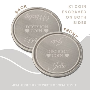 May include: A silver decision coin with the words "Decision Coin" and two hearts engraved on the front. The back of the coin has the words "Julie" and "We Married" engraved on it. The coin measures 4 cm in height, 4 cm in width, and 0.3 cm in depth.