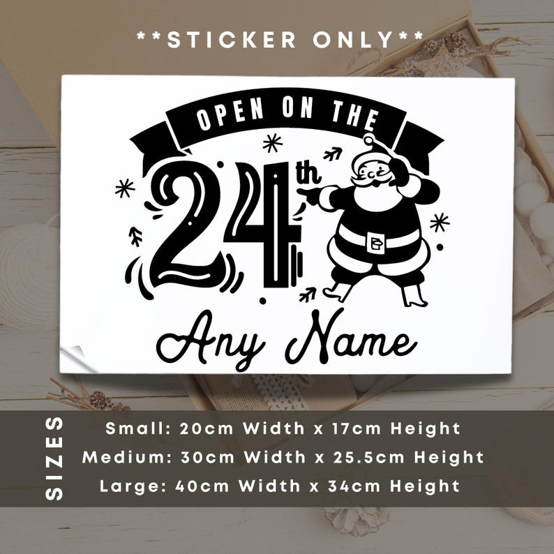 May include: Black and white sticker with a Santa Claus character pointing to the text "Open on the 24th". The sticker also includes the text "Any Name" and the sizes: Small: 20cm Width x 17cm Height, Medium: 30cm Width x 25.5cm Height, Large: 40cm Width x 34cm Height.
