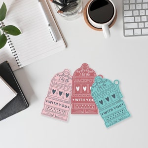 May include: Three printable Valentine's Day cards featuring a slot machine design with the text "I hit the JACKPOT with you". The cards are in pink, red, and blue.
