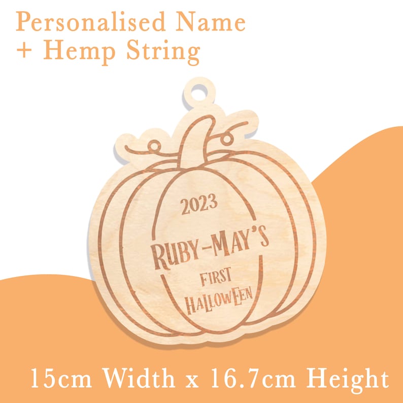 May include: Wooden pumpkin ornament with the text "2023 RUBY-MAY'S FIRST HALLOWEEN" and a hemp string for hanging. The ornament is 15 cm wide and 16.7 cm high.
