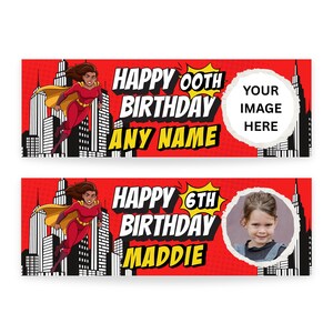 Puede incluir: Dos pancartas rojas de cumplea&ntilde;os con tem&aacute;tica de superh&eacute;roes. Una pancarta dice "Happy 00th Birthday Any Name" con espacio para una foto. La otra dice "Happy 6th Birthday Maddie" con una foto de una ni&ntilde;a.