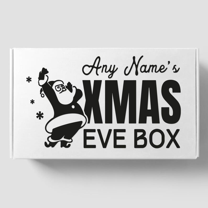 May include: White box with black text and a black and white illustration of Santa Claus. The text reads "Any Name's Xmas Eve Box".