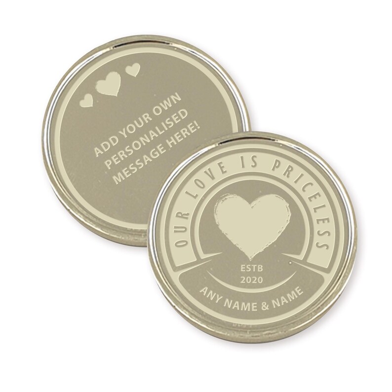 May include: Two silver-colored tokens with a beige background. One token has the text "Our Love Is Priceless" with a heart design and the text "ESTB 2020" and "Any Name & Name". The other token has the text "Add your own personalized message here!" with three hearts.