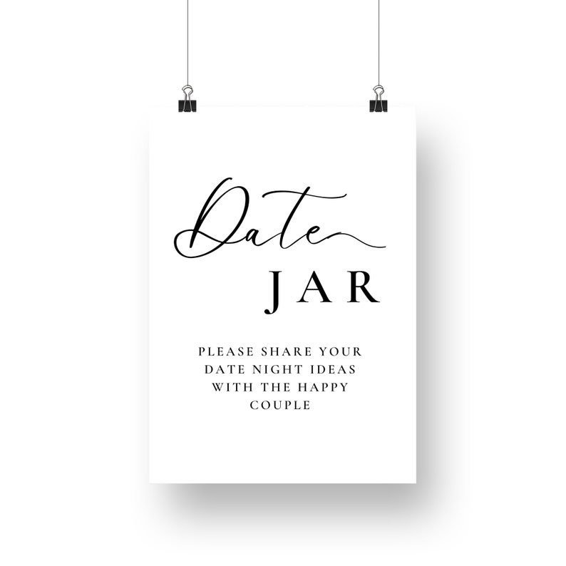 May include: A white sign with black text that reads "Date Jar" and "Please share your date night ideas with the happy couple".