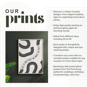 May include: Black and white abstract art print with the text "This is our place, we make the rules". The print is framed in a light wood frame and is displayed against a dark green background.