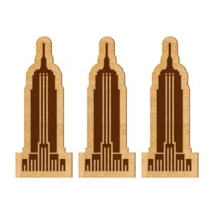 May include: Three brown cardboard cutouts of the Empire State Building, each with a brown silhouette of the building.