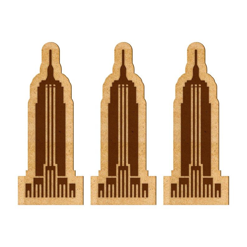 May include: Three brown cardboard cutouts of the Empire State Building, each with a brown silhouette of the building.