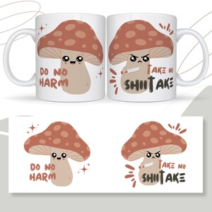 May include: White ceramic mug with a brown mushroom graphic on each side. The mushroom on the left side has a happy face and the text "Do No Harm". The mushroom on the right side has an angry face and the text "Take No Shitake".