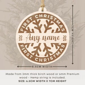 May include: A wooden Christmas ornament with the text "First Christmas" and a snowflake design. The ornament is 6.5 cm wide and 7 cm high, with space for a name and the year 2025. It includes a hemp string for hanging.
