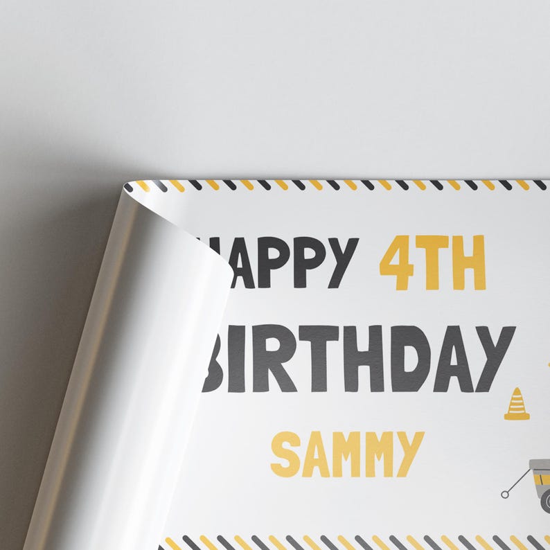 May include: A white birthday poster with the text "Happy 4th Birthday Sammy" in black and yellow. The poster has a construction theme with a yellow and black border.