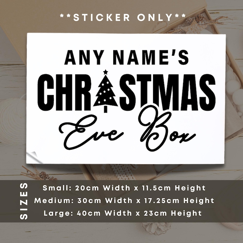May include: Black and white sticker with the text "ANY NAME'S CHRISTMAS Eve Box". The sticker features a small Christmas tree with a star on top. The text "SIZES" is visible on the left side of the image. The sticker is available in three sizes: small (20cm x 11.5cm), medium (30cm x 17.25cm), and large (40cm x 23cm).