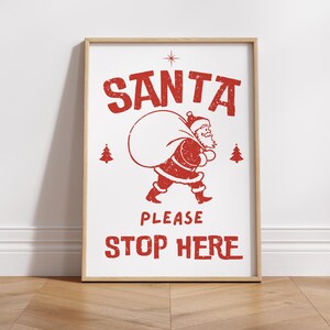 May include: A red and white printable sign with the text "SANTA PLEASE STOP HERE" and a cartoon image of Santa Claus carrying a bag of gifts.