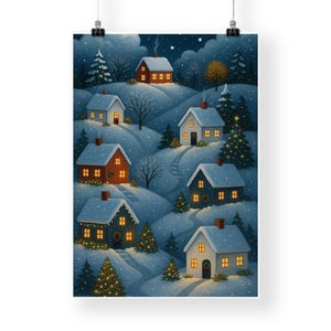 May include: A winter landscape art print featuring a village of snow-covered houses nestled on rolling hills. The houses have lit windows and are surrounded by snow-covered trees. The sky is a dark blue with stars.