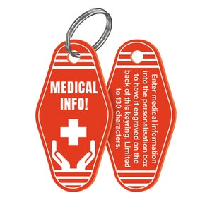 Pode incluir: Chaveiro vermelho em forma de chave de motel com uma cruz m&eacute;dica branca e m&atilde;os na frente. A parte de tr&aacute;s do chaveiro tem o texto "Insira informa&ccedil;&otilde;es m&eacute;dicas na caixa de personaliza&ccedil;&atilde;o para que sejam gravadas na parte de tr&aacute;s deste chaveiro. Limitado a 130 caracteres."